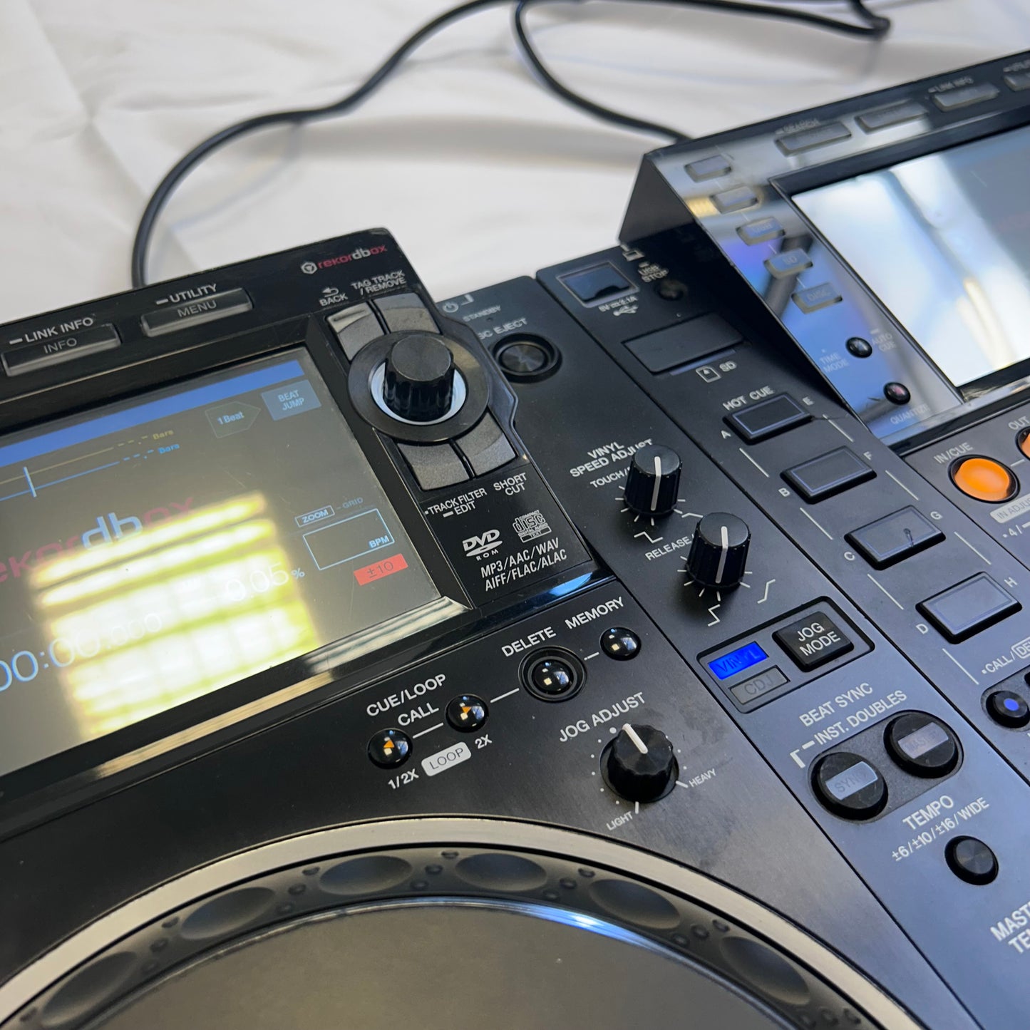 Used Pioneer CDJ 2000 NXS2 Pair - Professional DJ Media Players for sale at Turntable Trader – Refurbished DJ Equipment